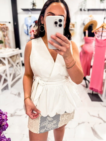 White Sleeveless Scolloped Hemline Wrap Blouse